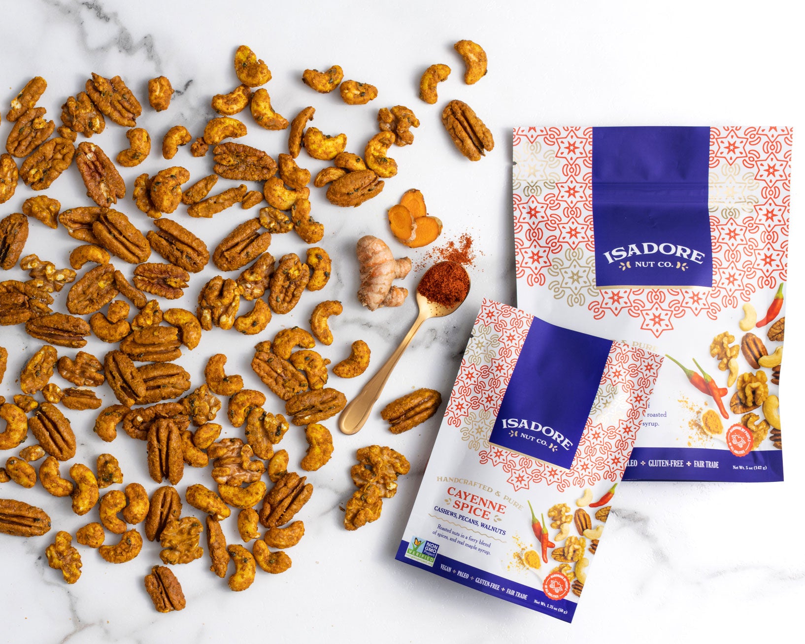 CAYENNE SPICE- Cashews, Pecans, Walnuts Roasted nuts in a fiery blend of spices, and real maple syrup. This spicy trio of seasoned nuts is high in antioxidants thanks to turmeric and black sesame seed. Pair it with a salad or an effervescent to heighten the heat.