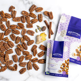 CHAI- Pecans Roasted pecans in a sweet, warming blend of spices, and real maple syrup. An award-winning snack that mimics a warm cup of tea with a unique combination of earthy turmeric, spicy cinnamon and a punch of bright ginger.