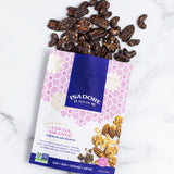 COCOA ORANGE- Cashews, Pecans, Walnuts Roasted nuts in a dark cocoa blend of spices, and real maple syrup. A blend of cocoa, orange and savory-sweet cardamom meld together to create a snack that’s bright, memorable and satisfyingly sweet.