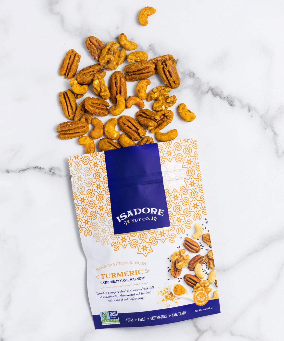 TURMERIC- Cashews, Pecans, Walnuts Roasted nuts in a peppery blend of spices, and real maple syrup. Golden turmeric and black pepper work together to create a savory snack with heat, depth and a whole lot of nutrients in every single bite.