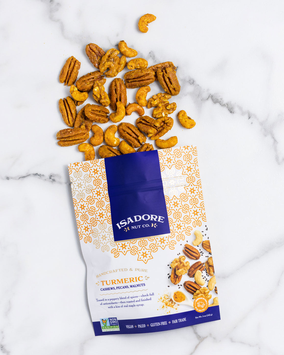 TURMERIC- Cashews, Pecans, Walnuts Roasted nuts in a peppery blend of spices, and real maple syrup. Golden turmeric and black pepper work together to create a savory snack with heat, depth and a whole lot of nutrients in every single bite.