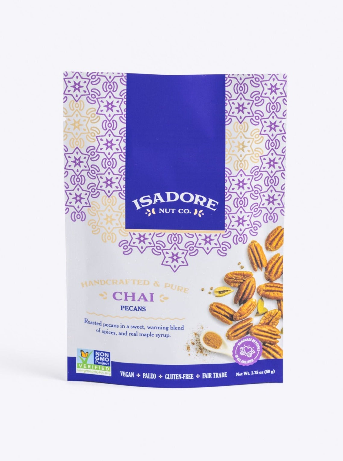 CHAI- Pecans Roasted pecans in a sweet, warming blend of spices, and real maple syrup. An award-winning snack that mimics a warm cup of tea with a unique combination of earthy turmeric, spicy cinnamon and a punch of bright ginger. front.